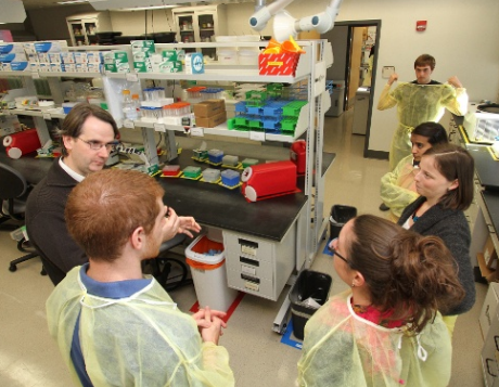 Josep Bassaganya-Riera, director of the Virginia Bioinformatics Institute's Nutritional Immunology and Molecular Medicine Laboratory, advises student researchers