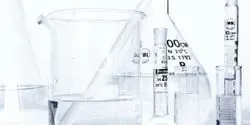 Several flasks, beakers, and test tubes on laboartory bench illustreating the importance of working safely with laboratory glassware