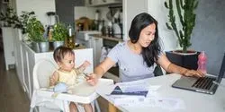 scientist working from home with young child