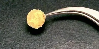 gold "coin" made from nanoparticle building blocks