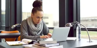 researcher searching for academic papers on Google Scholar