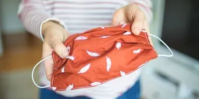 cotton face mask to help prevent COVID-19 spread