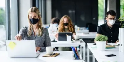 mask wearing and social distancing in the office