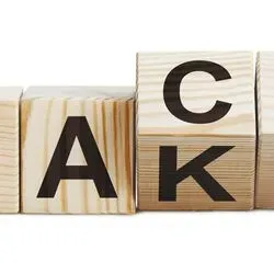 Wooden blocks shifting from the word fact to fake