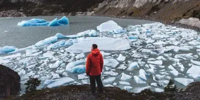 Man looking at ice bergs