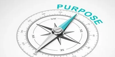 Image of a compase pointing to the word purpose