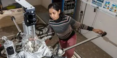 Dr. Aparajita Singha with one of the ESR-enabled STM systems at QNS