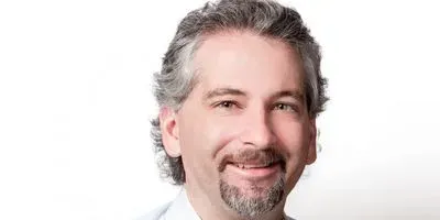 INRS Professor Charles Dozois, specialist in microbiology and immunology and the identification and characterization of bacterial genes affecting humans, poultry and pigs.