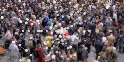 Image of people walking in a crowd