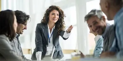 Woman leader running a meeting