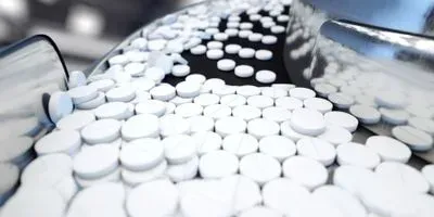 Pills on a conveyor