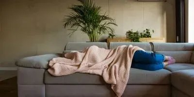 Person sleeping on a couch