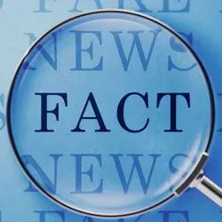 A magnifying lens over the word fact