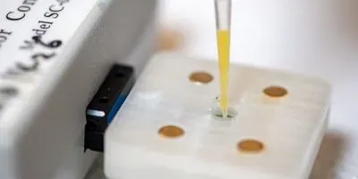 Engineers tested the sensor device on samples of orange juice that they spiked with glyphosate for the study.