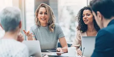 Women leading a meeting