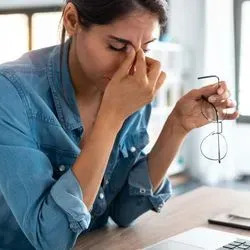Women stressed at her computer at home
