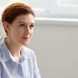 Female boss listening to employee