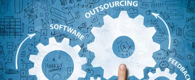 A photo illustration with a mix of small and large white gears on a blue background. Three of the gears are labeled, "software," "outsourcing,," and "feedback" and there is a finger touching the "outsourcing" gear.