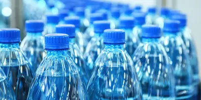 Plastic water bottles on a conveyor to be shipped out