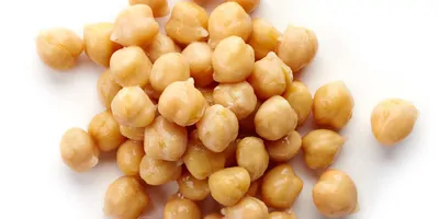 Image of several chickpeas on a white background
