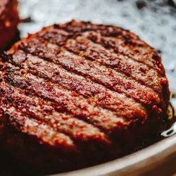 Veggie burger being grilled