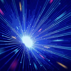 Abstract image of light and particles shining towards the camera