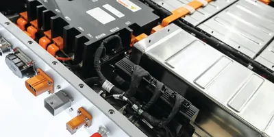 Batteries with black, grey, and orange components.
