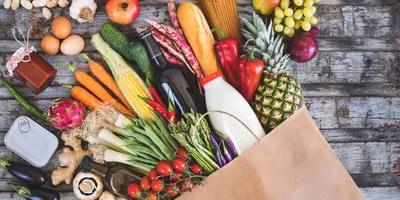 fruits and vegetables in grocery bag
