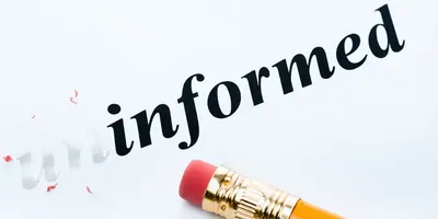 The word informed witten on paper with the letters "Mis" erased out