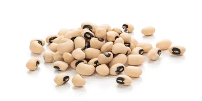 Black-eyed beans pilled on a white background