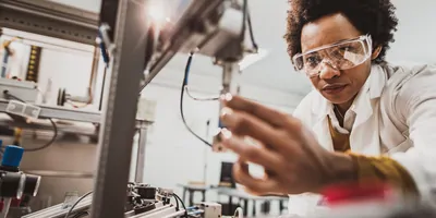Female researcher working with equipment