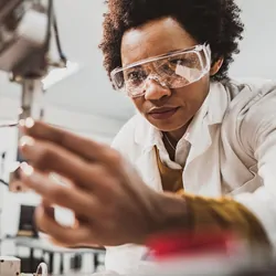 Female researcher working with equipment