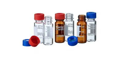 A handful of collection vials on a white background