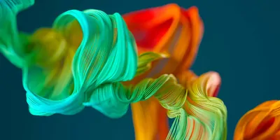 Abstract image of multi colored fabric like material on grey background 