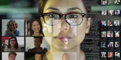 Woman's face double exposed with a screen shot of a video call
