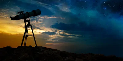 Telescope sitting outside at dawn