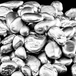 Pile of nickle on a black background