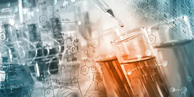 Researcher dropping the clear reagent into test tube with periodic table and chemical equations background, for reaction testing in chemical laboratory