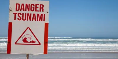 Tsunami warning sign on a beach