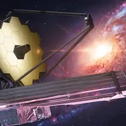 The James Webb Telescope arrayed against a galaxy backdrop