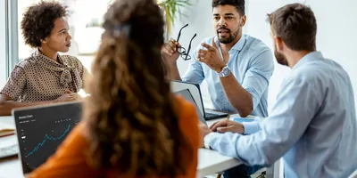 Group of young people in a meeting, working as a team