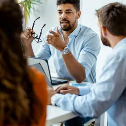 Group of young people in a meeting, working as a team