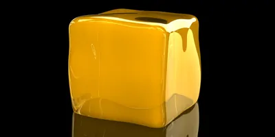 Yellow colloid cube on a black background