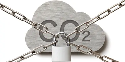 Steel cloud with CO2 carved into it on a white background with chains making an "X" in front