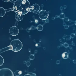 Glass molecule models on a blue background