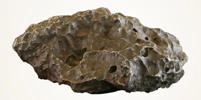 A piece of meteorite on a white background