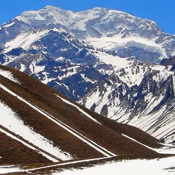 Snowcapped Mount Aconcagua and glacier lake