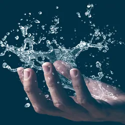 A human hand holding a graphic splash of water