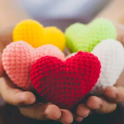 Mixed colors yarn heart on giving hands