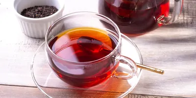 A mug of tea sitting on a table